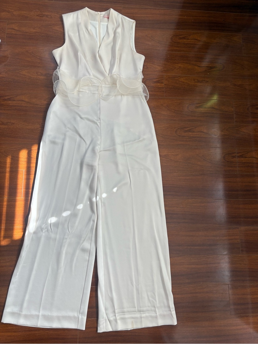 Sleeveless White Wide-Leg Jumpsuit with Sheer Waist Detail